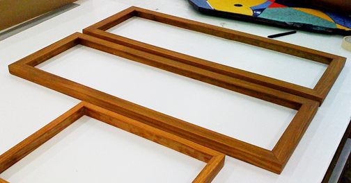 finished teak frames ready for fitting
