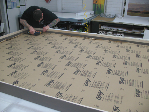 fitting matching maple spacers into the finished frame