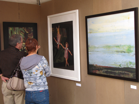 ArtWalk guests discuss work by Jason Sherry, Jenna Refuerzo & Don Strandberg