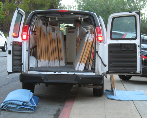 packing the van full of maple picture frames